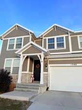 View of front of house with a garage