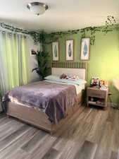 Bedroom featuring hardwood / wood-style floors