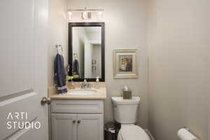 Bathroom featuring toilet and vanity