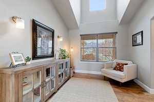 Living area featuring hardwood / wood-style floors