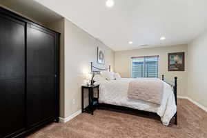 View of carpeted bedroom