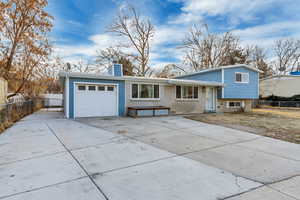 Split level home featuring a garage