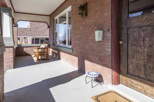 View of patio with covered porch