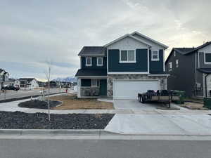 View of front of house with a garage