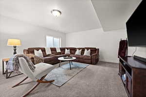 Living room with light colored carpet