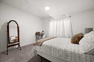 Bedroom featuring carpet floors