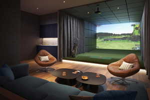 Recreation room featuring golf simulator and hardwood / wood-style floors