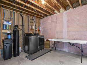 Basement featuring washer and clothes dryer