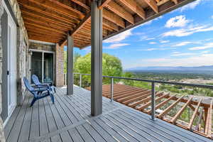 Wooden deck featuring a mountain view