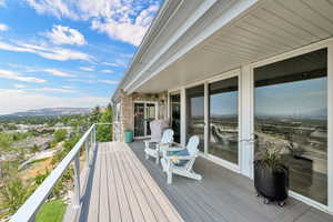 Wooden deck featuring a mountain view