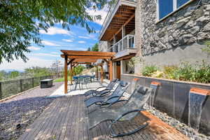 Wooden terrace with a patio area