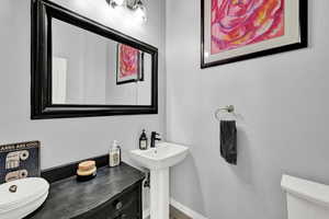 Bathroom with sink and toilet