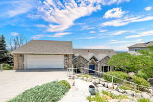 View of front of home featuring a garage