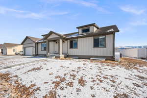 View of front of property with a garage