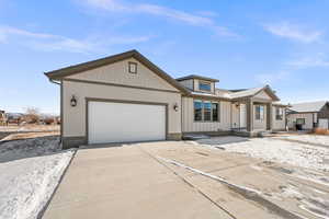 View of front of house with a garage