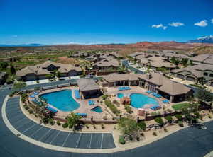 View of swimming pool with a mountain view