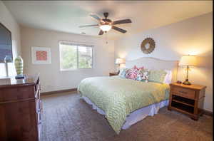 Bedroom featuring carpet floors and ceiling fan