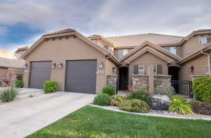 View of front of property featuring a garage