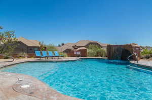 View of pool featuring pool water feature