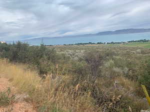 Mountain view featuring a water view