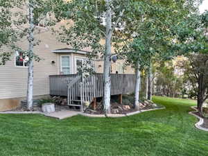 View of yard with a deck