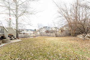 View of yard with a deck