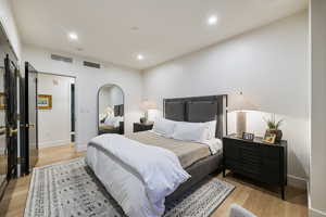 Bedroom featuring light wood-type flooring