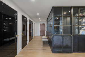 Hallway featuring light hardwood / wood-style floors