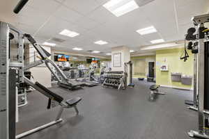 Gym featuring a drop ceiling