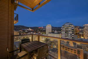 Balcony featuring a mountain view