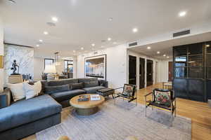 Living room featuring light hardwood / wood-style flooring and french doors