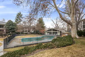 View of pool featuring a yard and a patio