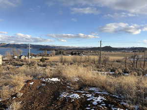 Property view of mountains with a rural view