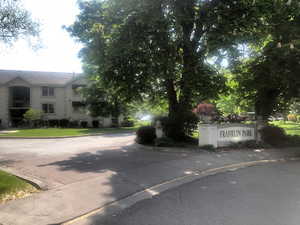 View of property hidden behind natural elements