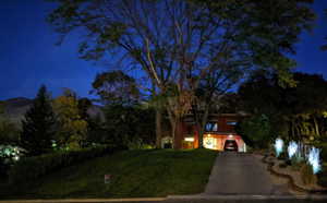 View of front of property with a lawn