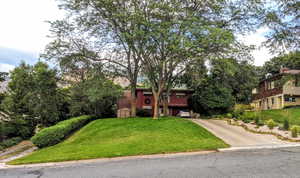 View of front of property with a front lawn