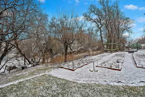 View of yard covered in snow