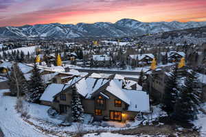 Snowy aerial view with a mountain view