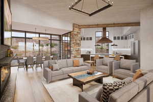 Living room featuring a high ceiling and light hardwood / wood-style flooring