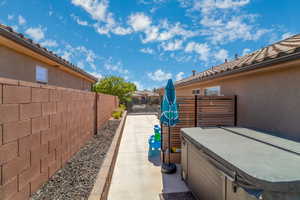 View of patio / terrace featuring a hot tub