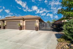 View of front of home featuring a garage