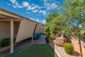 View of yard with a patio area