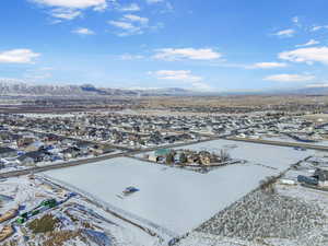 Snowy aerial view with a mountain view