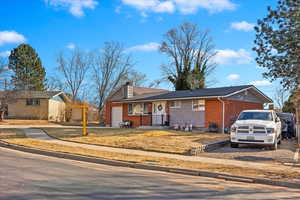 Single story home featuring a garage