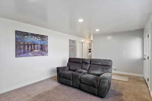 Living room featuring carpet flooring