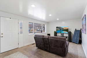 Living room with light colored carpet