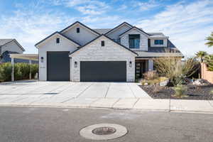 View of front of home featuring a garage