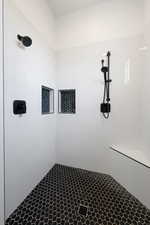 Bathroom with tiled shower