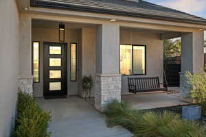 Entrance to property with covered porch