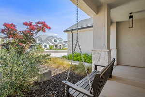 Exterior space with covered porch and a residential view